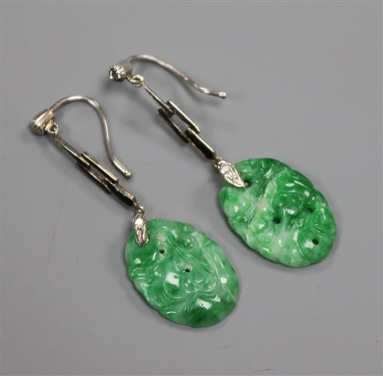 A pair of 9ct white gold, diamond and carved jadeite drop earrings, 37mm.